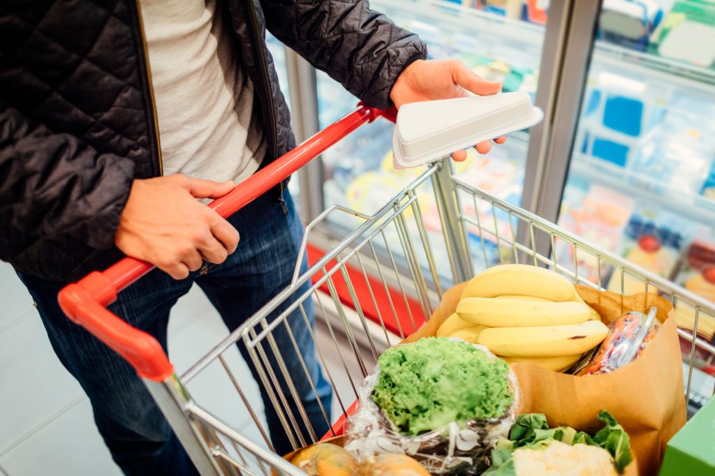 Young Man In A Supermarket.