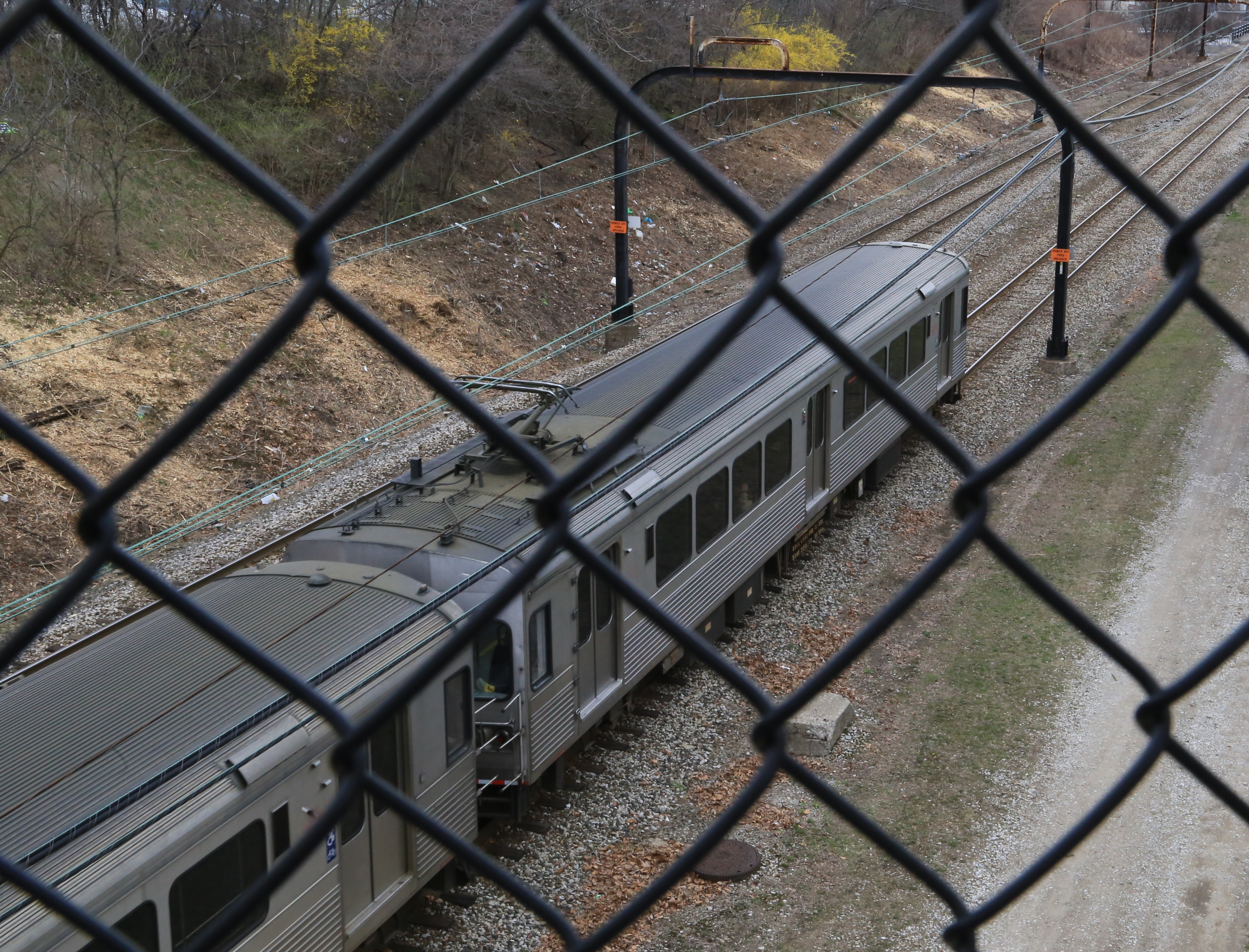 Public transit train seen through overpass , Cleveland, Ohio, USA