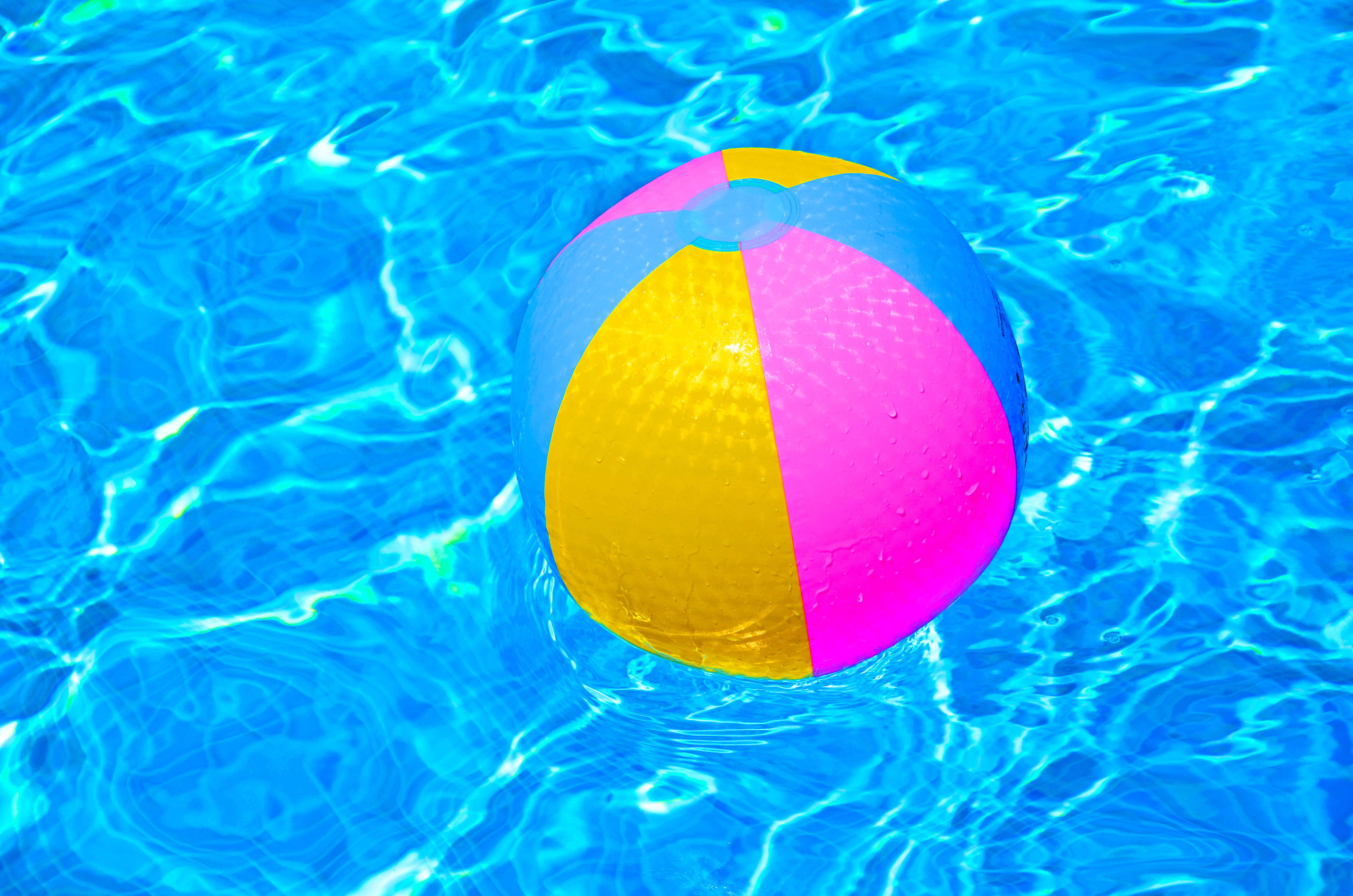 High Angle View Of Colorful Ball On Swimming Pool
