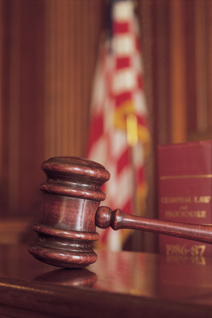 Gavel on bench in courtroom
