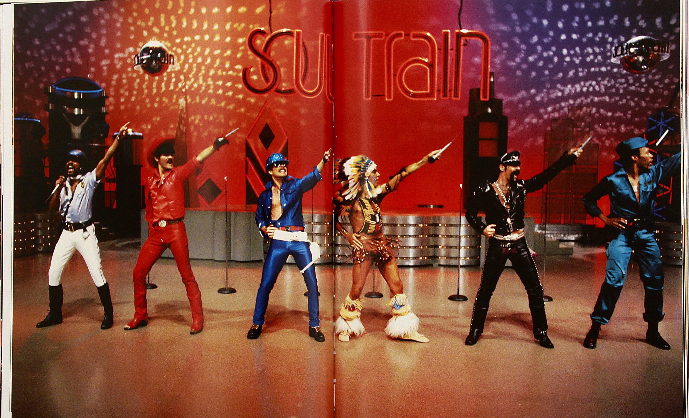 The book on Soul Train the dance show, by Don Cornelius, that sported wide lapels and afros, Metall