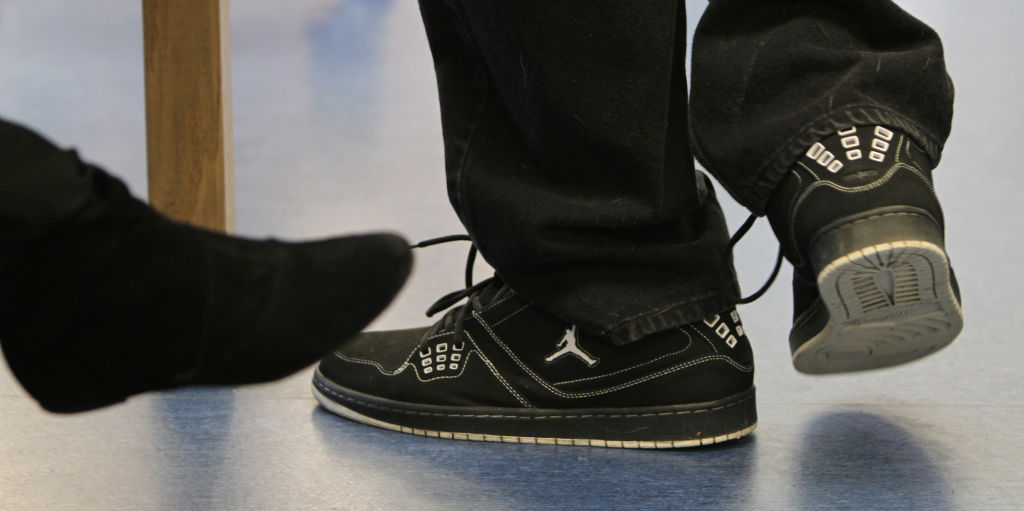 BRUCE BISPING ‚Ä¢ bbisping@startribune.com St. Anthony Village, MN., Tuesday, 12/15/2009] (center) Towering over most students at 6 foot, 7 inches, St. Anthony Village Substitute Teacher Neil Brackett walked between the desks talking to students duri