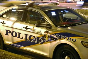 Full frame of a Police car with flashing lights