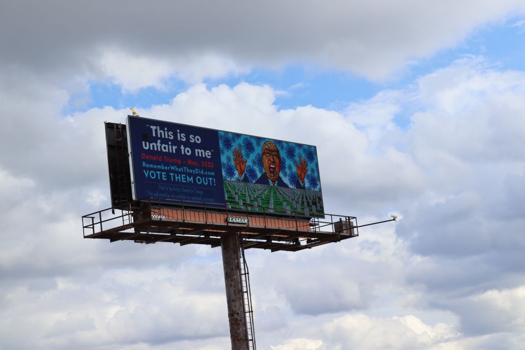Barrage Of Anti-Trump Billboards Greet President In Cleveland On Way To Presidential Debate
