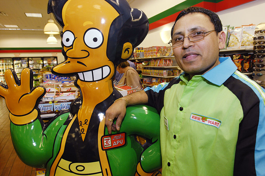 7-Eleven manager D.G. Suthar hangs out with cartoon propriet