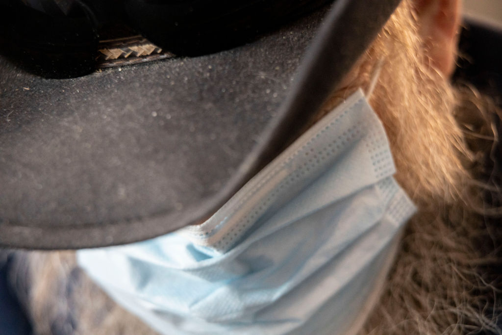 Roger Hadnell receiving the vaccine on the first day of the...