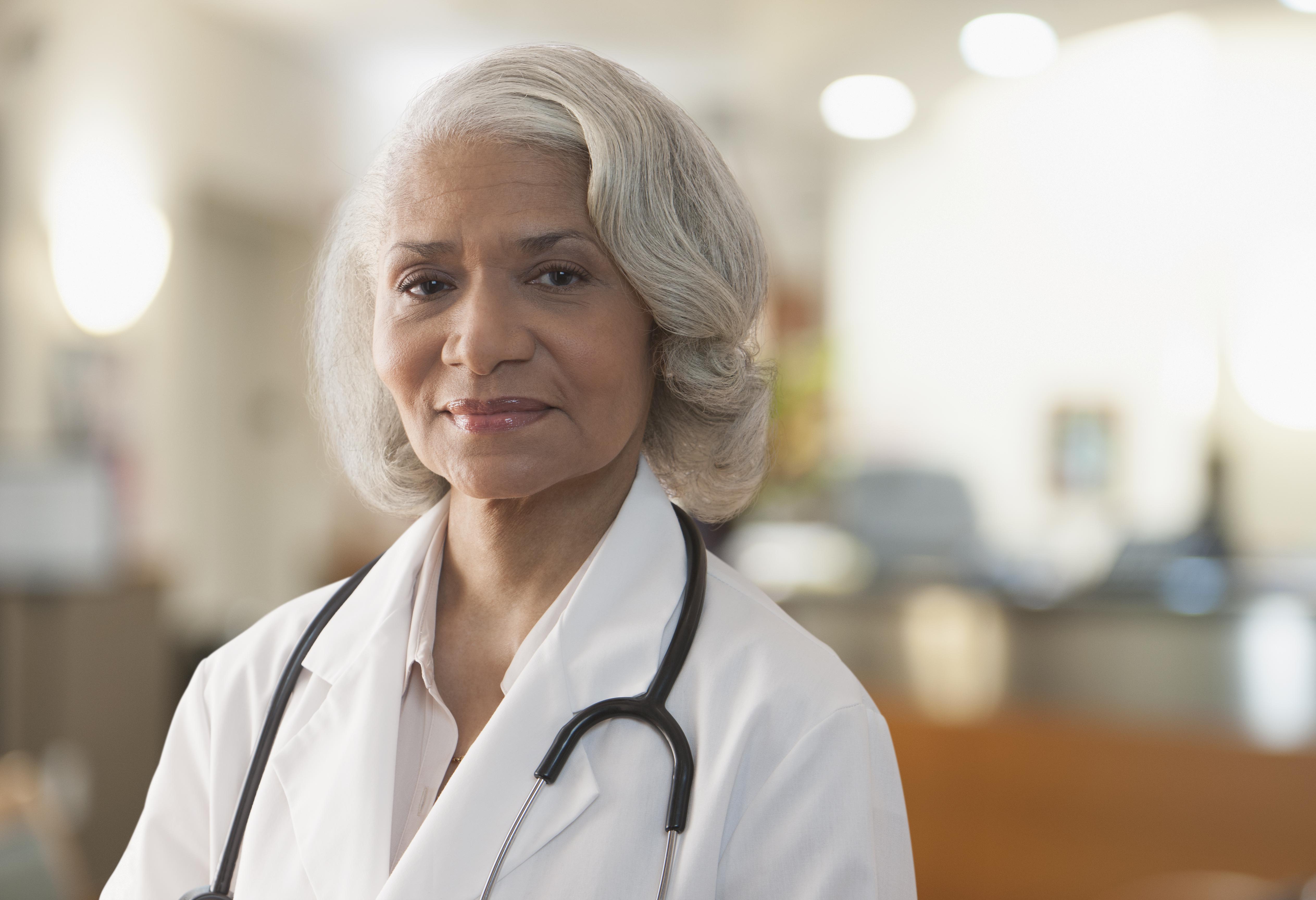 Black doctor standing in hospital